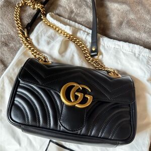 Authentic Gucci Black Leather Shoulder Bag with Gold Accents